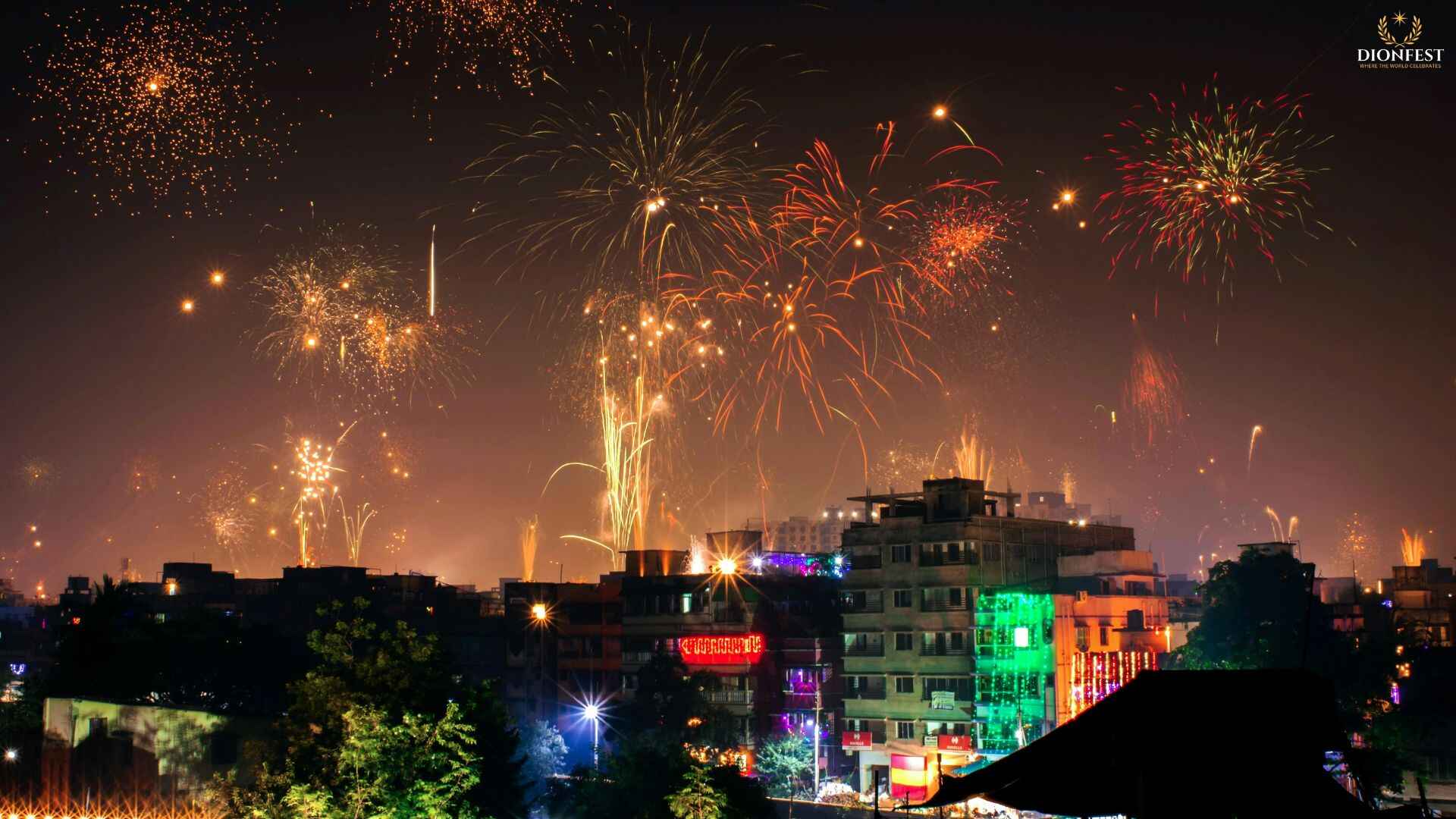 Diwali fireworks lighting up the night sky over a city skyline