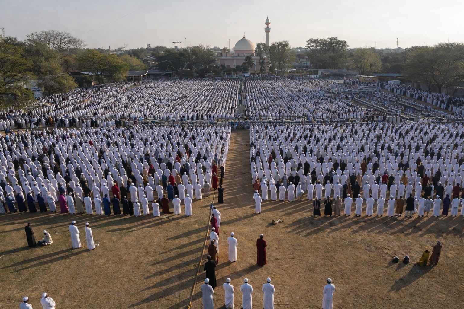 Mass Eid al-Fitr 2026 morning prayer gathering in open ground
