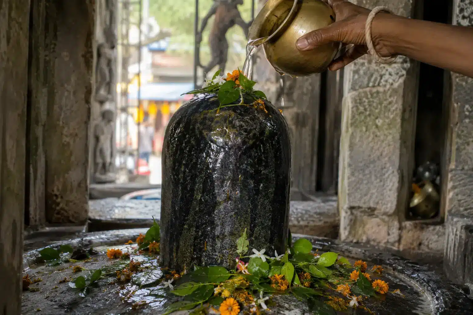 Ganga water poured on a Shiva lingam during Kanwar Yatra 2026 jalabhishek ritual