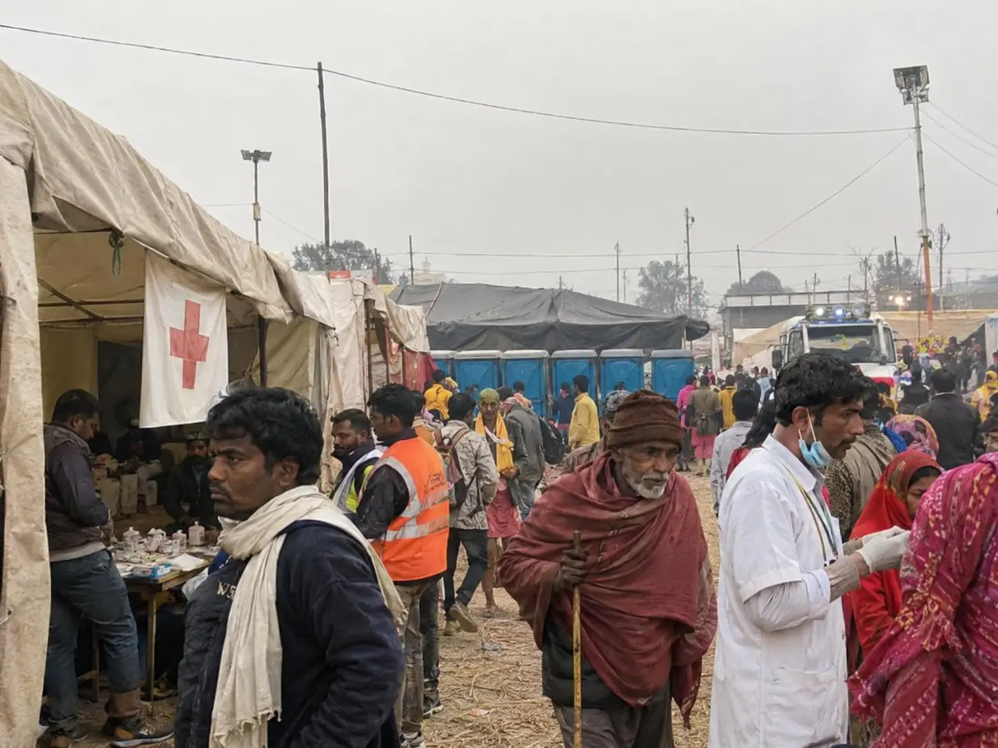 Temporary sanitation and medical infrastructure strained by large festival crowds