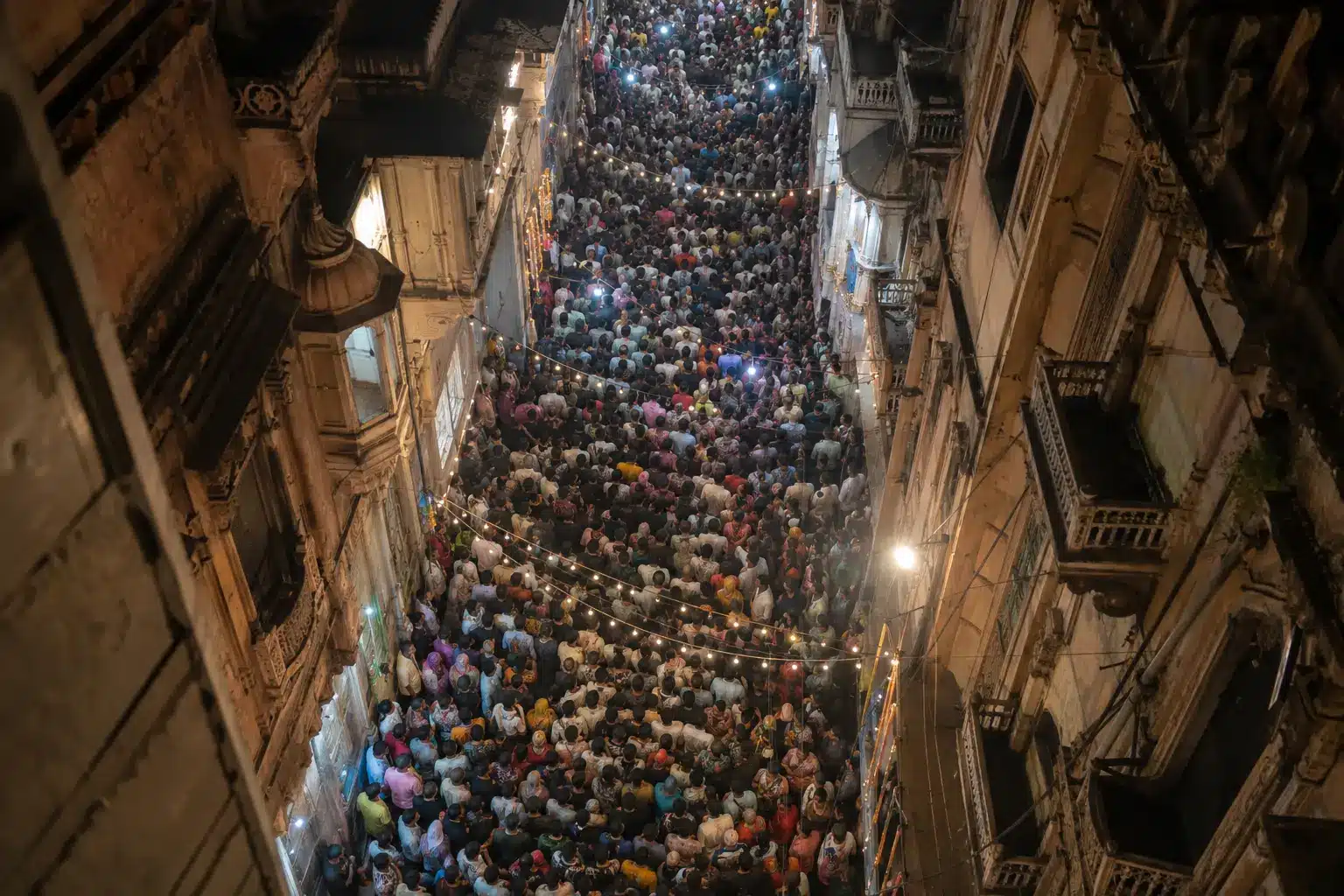 Janmashtami 2026 crowd density — pilgrims packed into Vrindavan's narrow four-metre-wide lanes at night