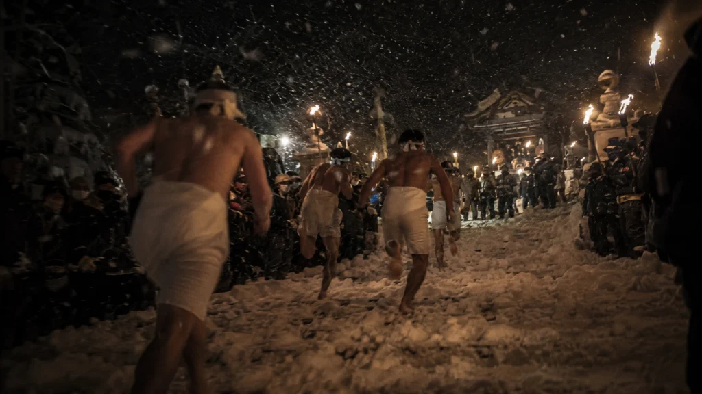 Traditional festivals that are disappearing — night ritual scene inspired by Japan's final Sominsai Festival
