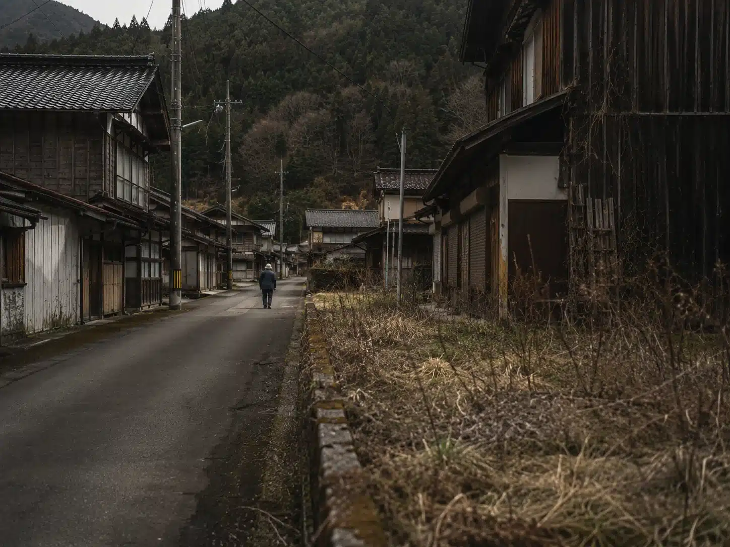 Empty rural village street illustrating the depopulation behind disappearing traditional festivals