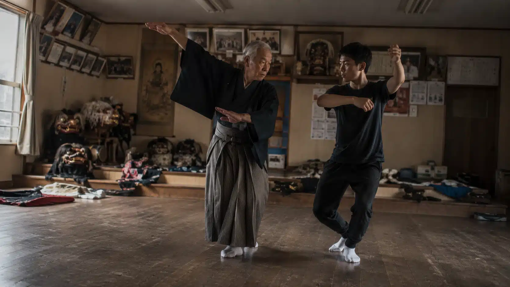 Elder teaching a younger community member traditional dance, an example of reviving disappearing festivals