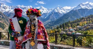 Raulane Festival : A traditional stone village in the Kinnaur valley, Himachal Pradesh, with snow-capped peaks behind